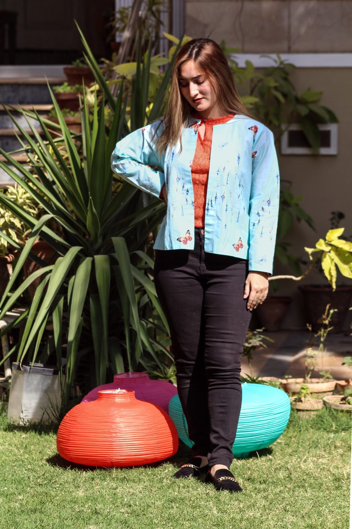 Baani model styled with colorful lantern props