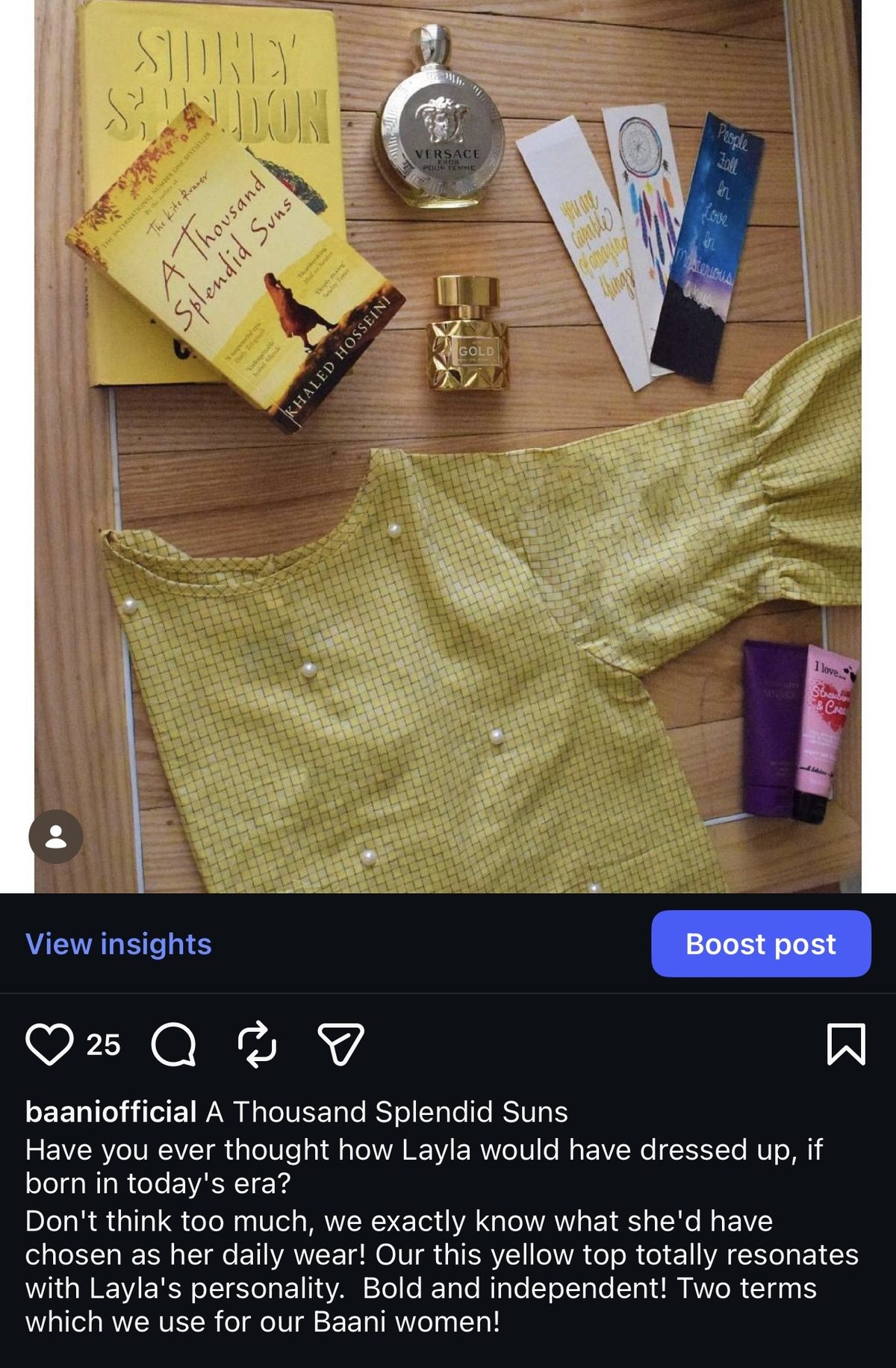 Baani literary flatlay featuring a yellow top and A Thousand Splendid Suns
