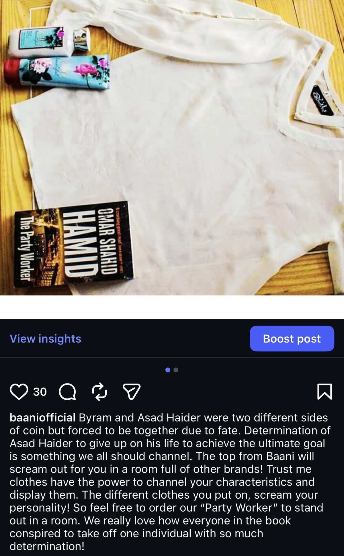 Baani literary flatlay featuring a white top and book